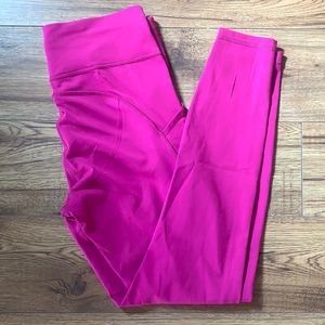Fast and free running tight. Lululemon size 10 length 28. Colour fuschia.